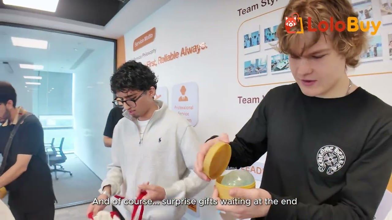 Still from Lolobuy's own office tour video, showing staff unwrapping a package at the company's service desk